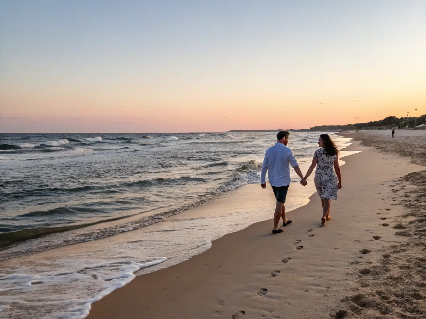 A retired couple enjoys a leisurely walk on a beach at sunset, representing the peace of mind from secure retirement income.